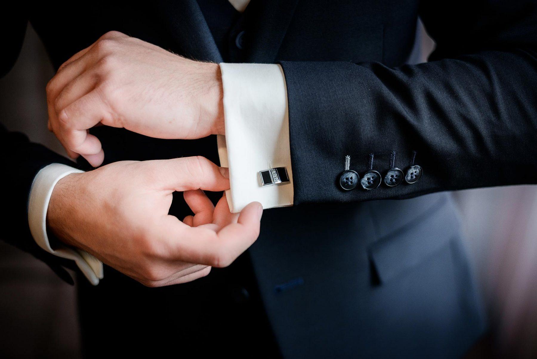 A close-up photo of a Mykonos concierge in a suit