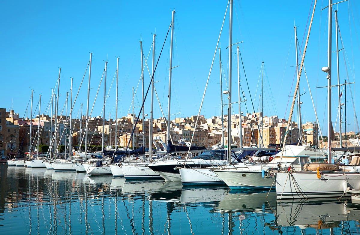 Yachts waiting in Mykonos Marina Port