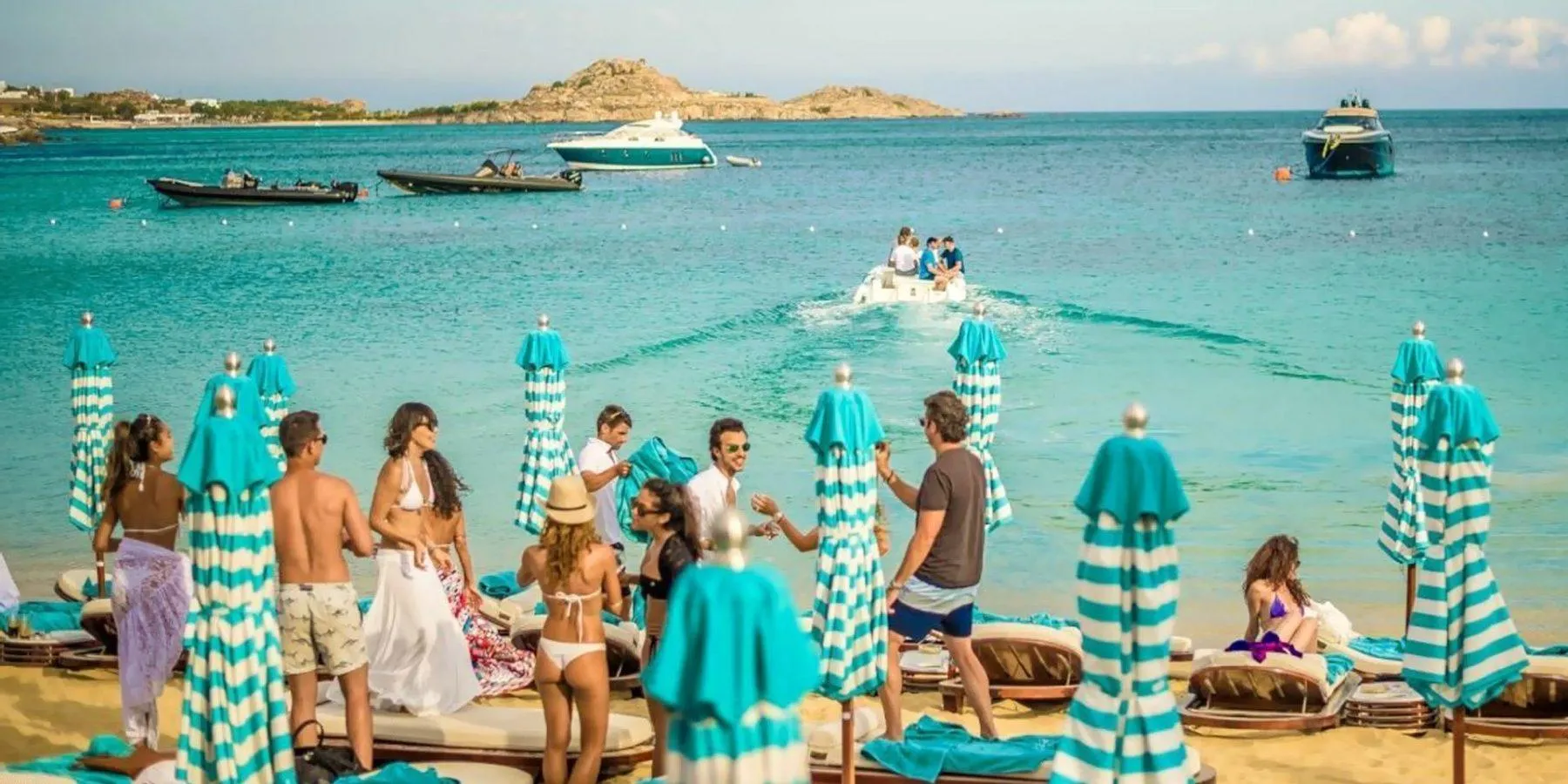 Nammos beach club with sunbeds and parasols