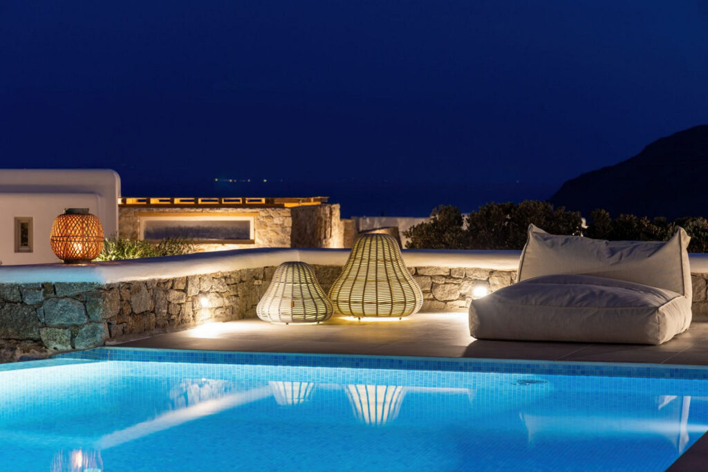 Luxurious swimming pool by the night in Mykonos' finest private home for rent.