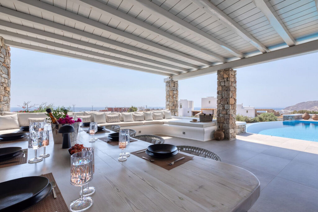 Dine out at the splendid terrace of Mykonos' luxurious villa for rent.