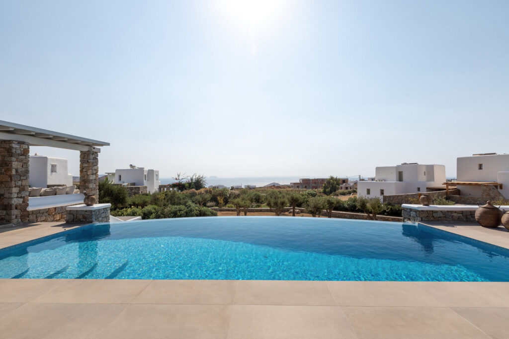 Spacious swimming pool in lavish Mykonos villa for rent.