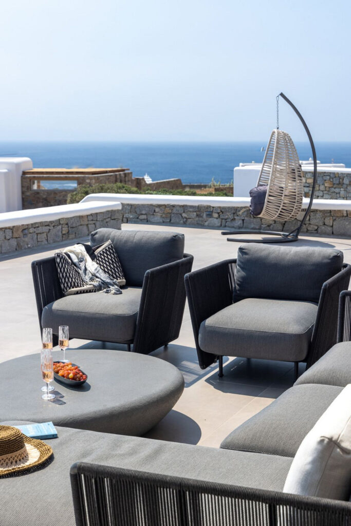 Comfortable terrace furniture in Mykonos' lavish villa for rent.