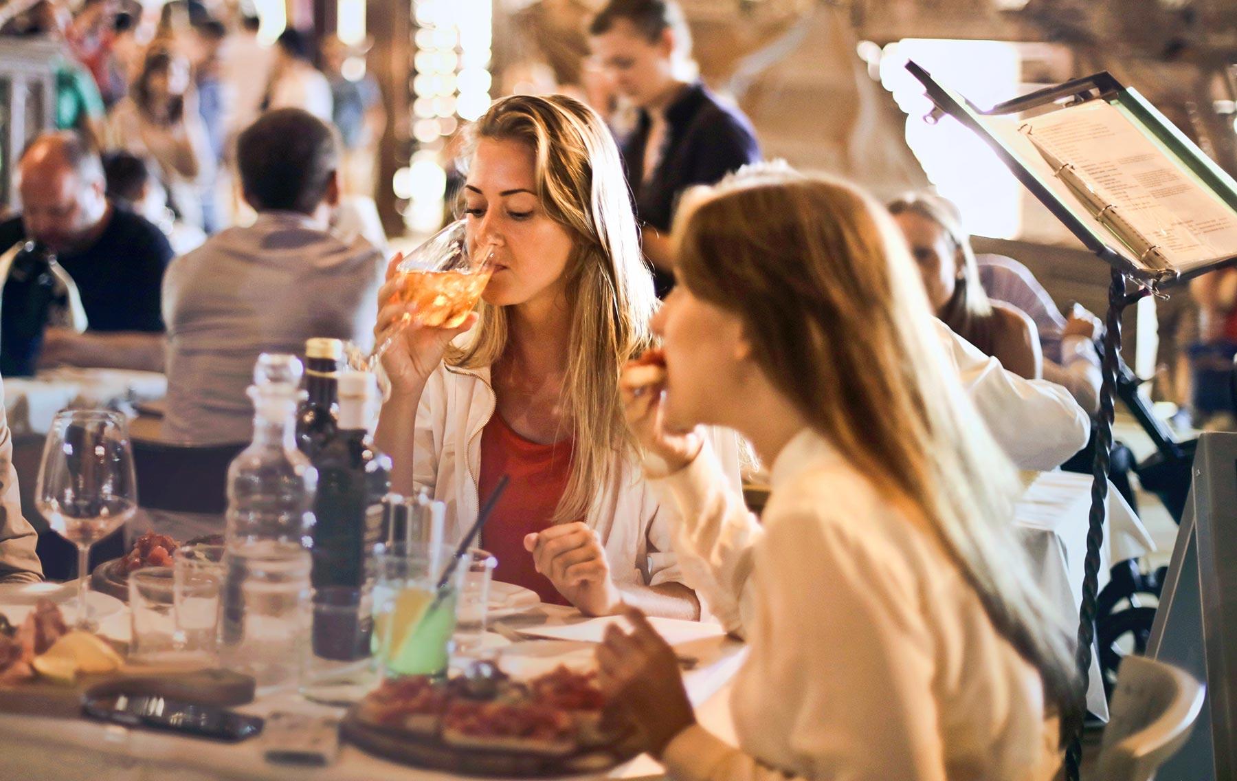 Women enjoying food at a restaurant