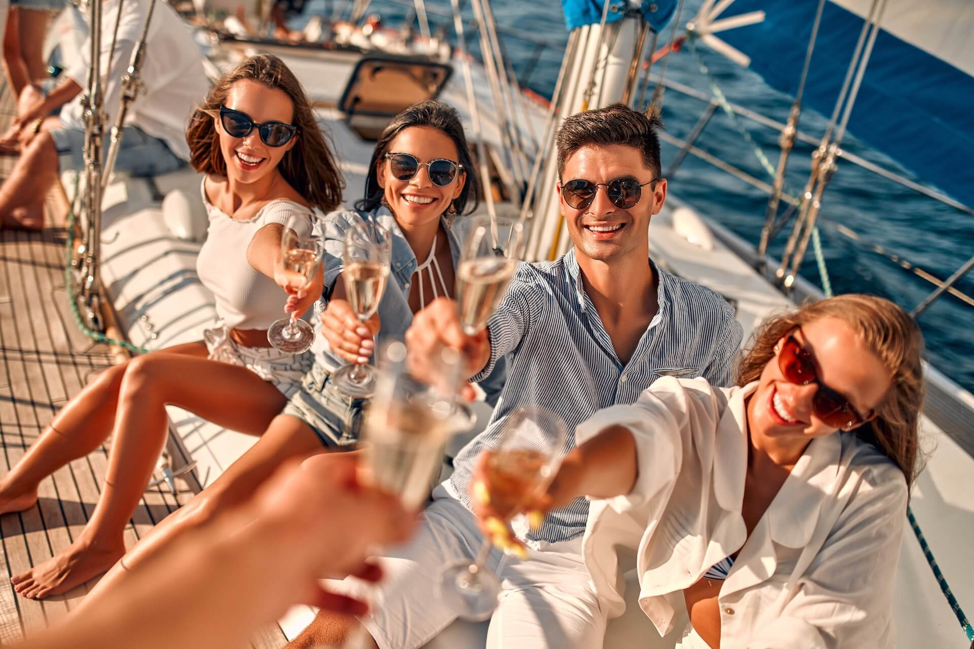 People drinking champagne on a boat