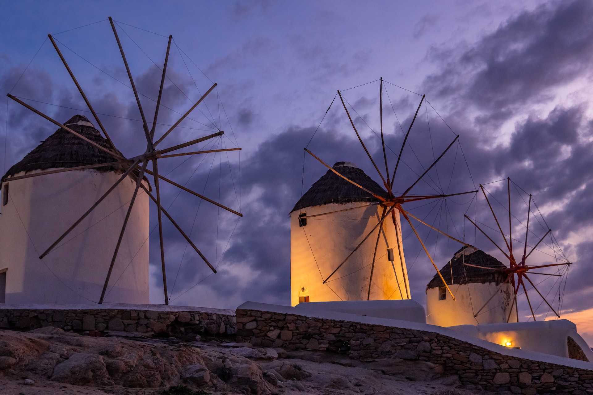Mykonian windmills during sunrise