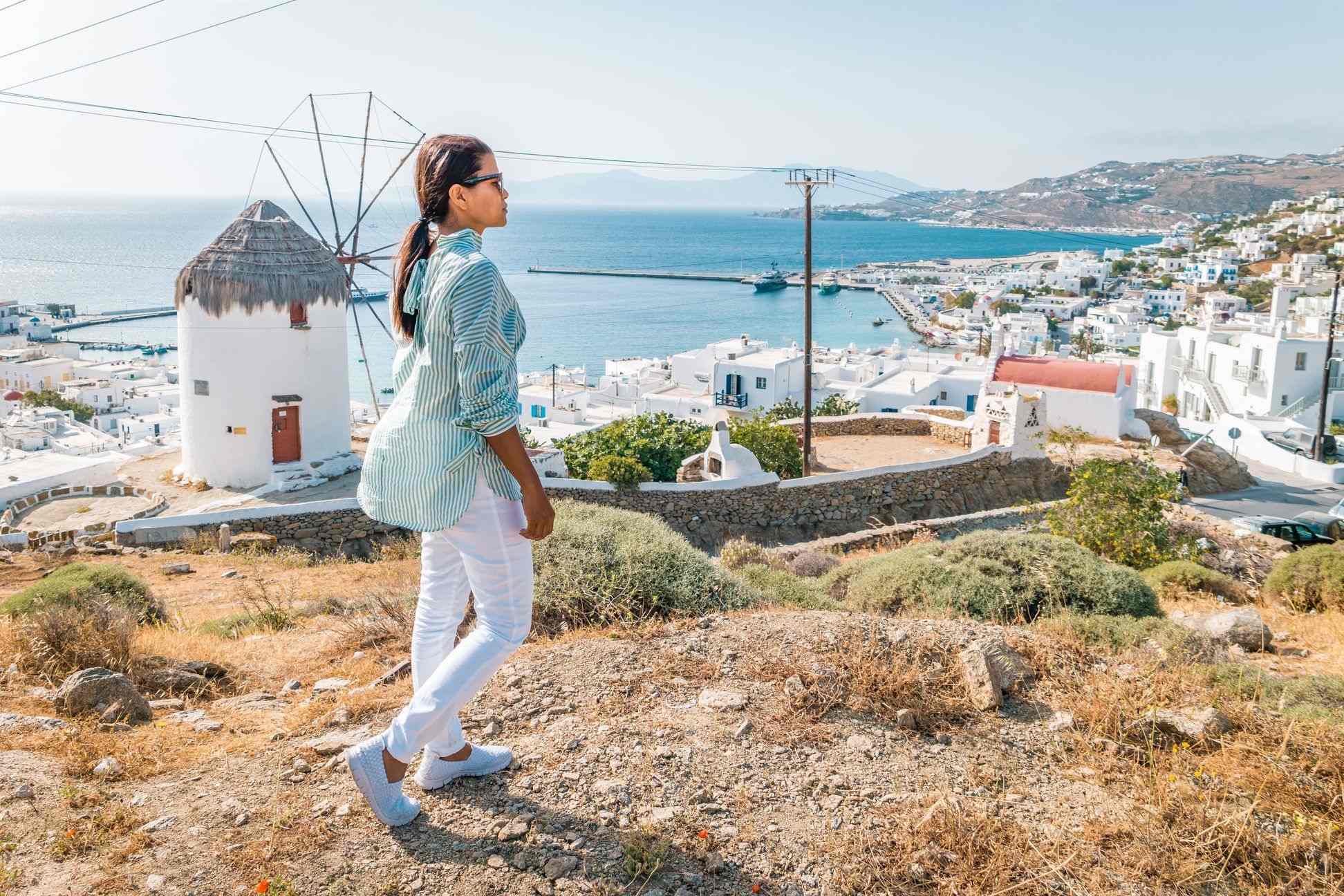 Girl hiking around Mykonos Greece