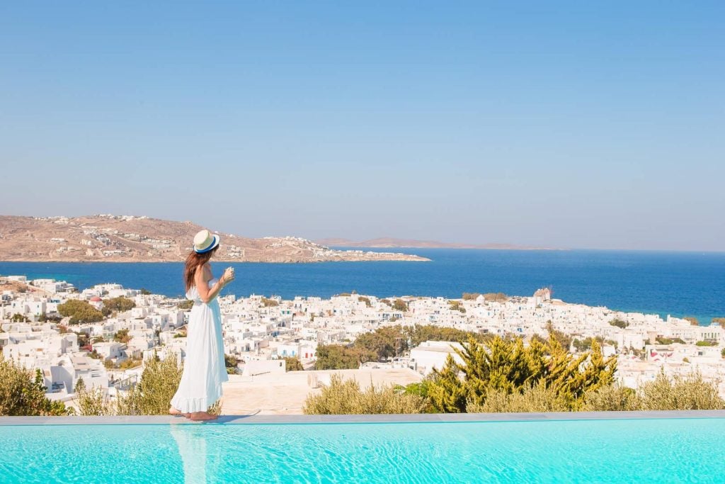 Woman overlooking the beautiful beach on Mykonos