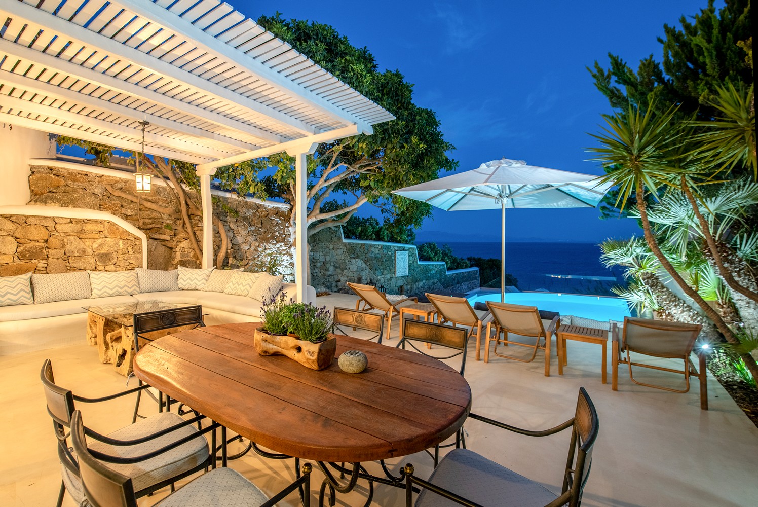 Outdoor area of one of the Mykonos luxury villas with a sea view