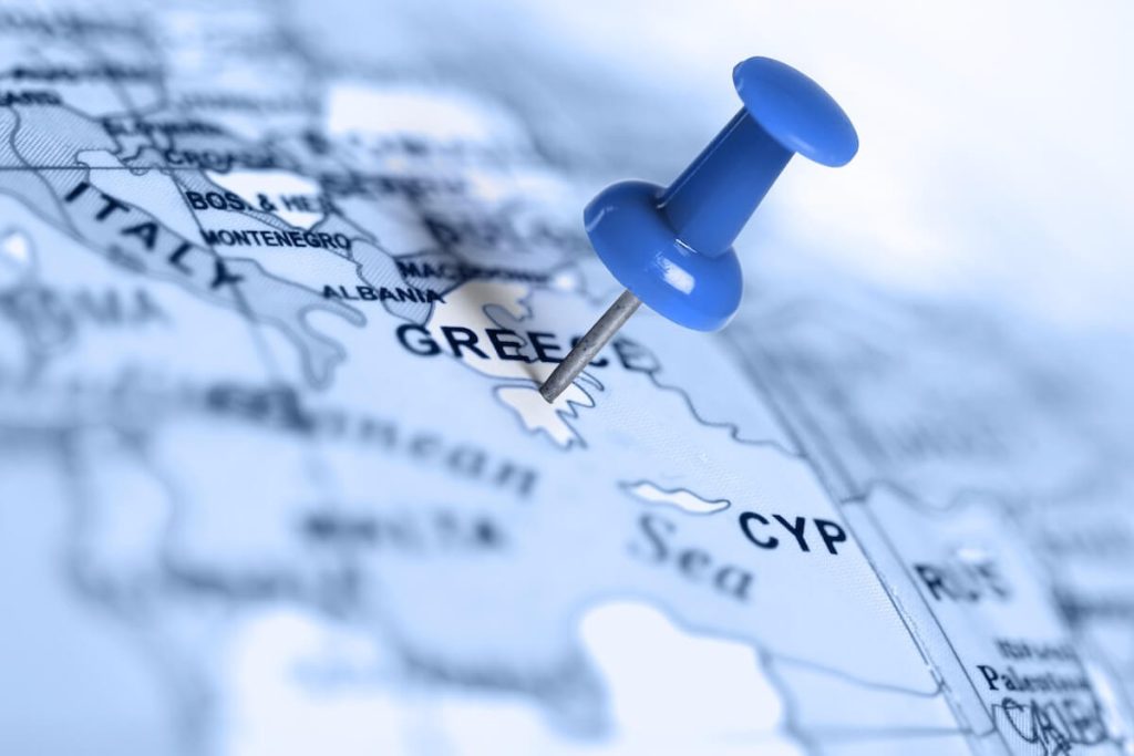 Map with a pin pointing at Greece