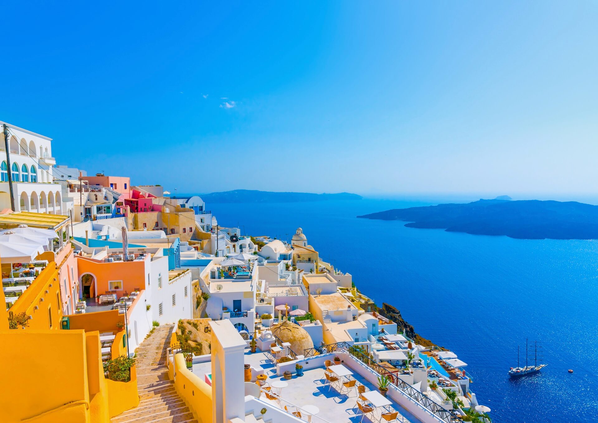 Colorful Santorini houses and blue sea