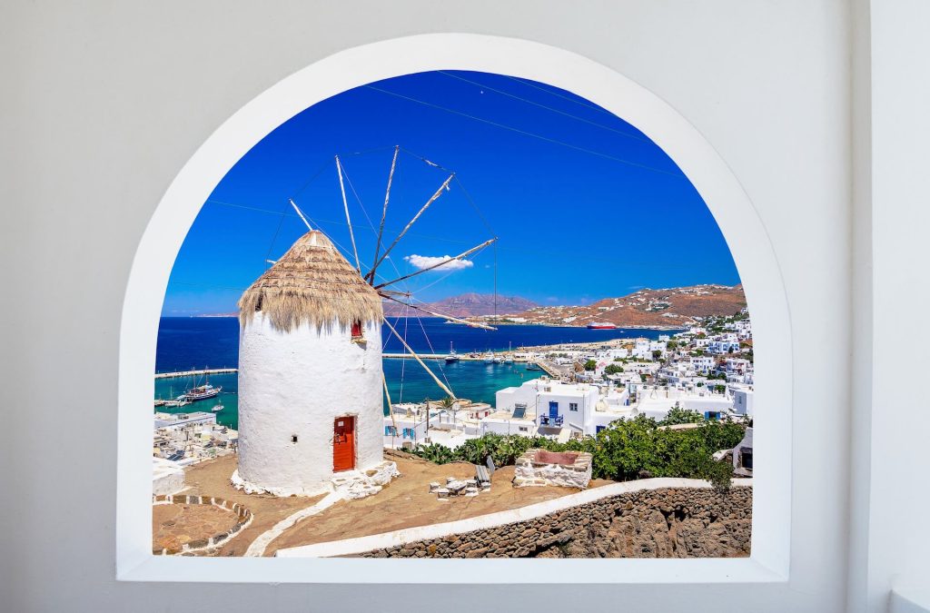 The view of four windmills at the coast of Mykonos