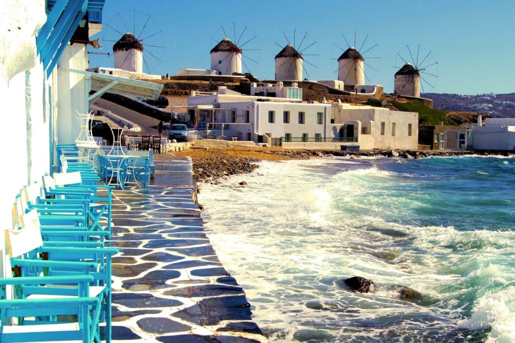 View of the windmills from Little Venice in Mykonos