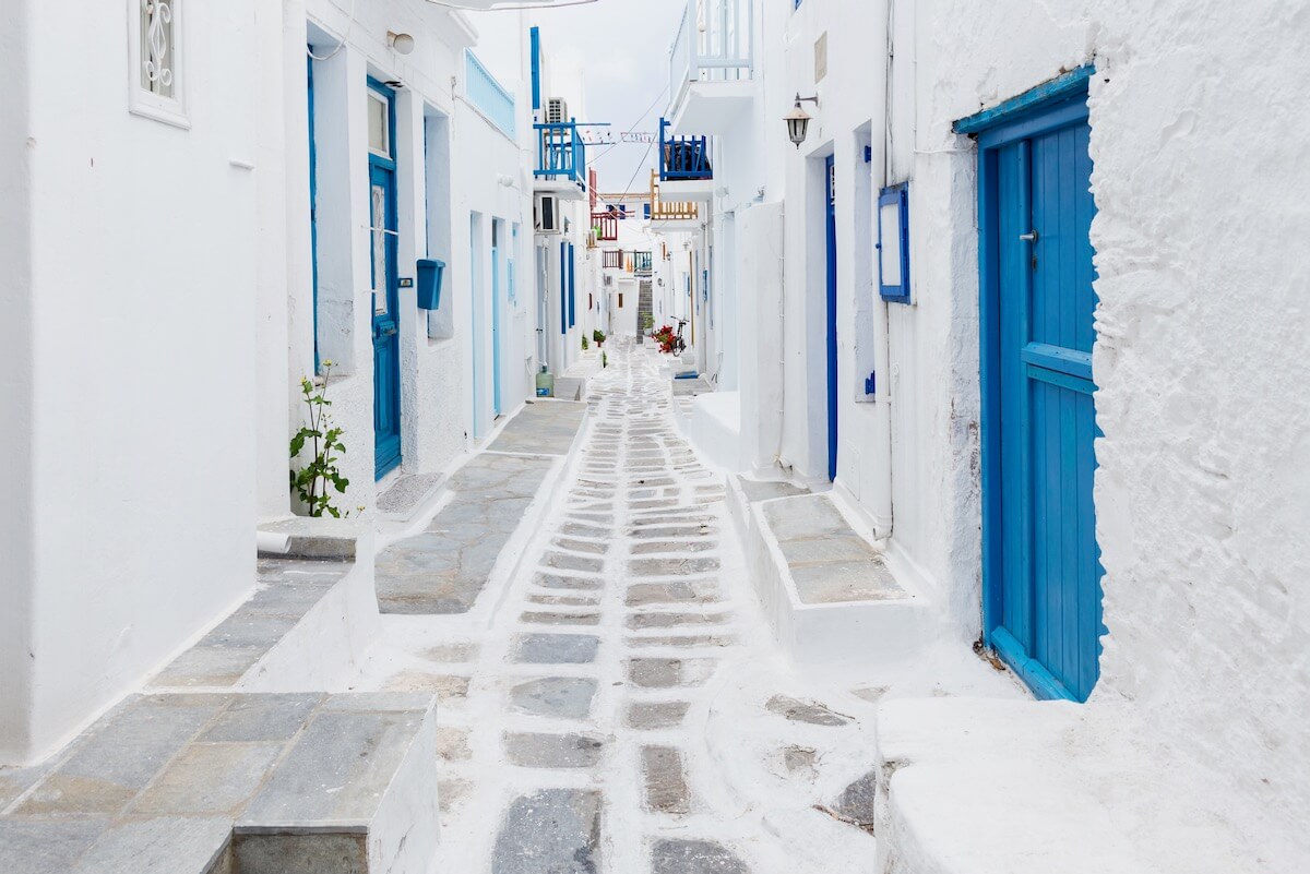 White houses with blue doors and windows