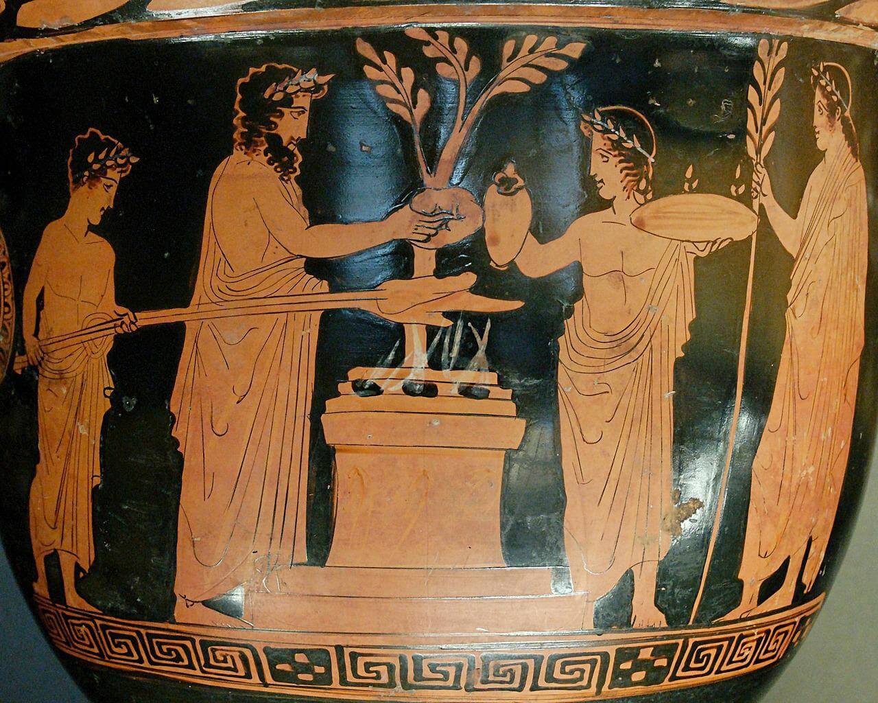 A greek vase with a depiction from greek mythology