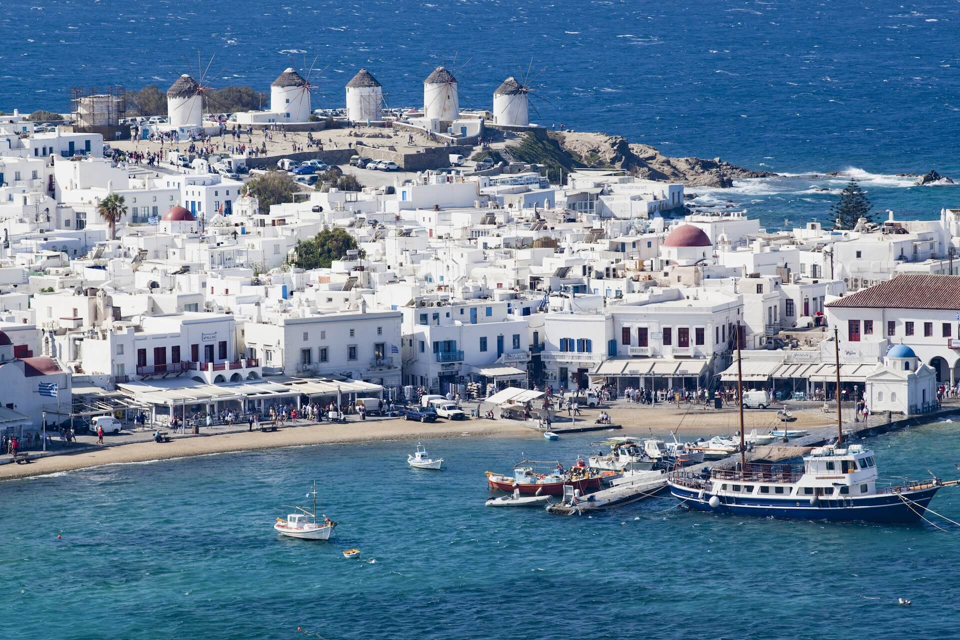 View of the windmills and the old port in Mykonos town