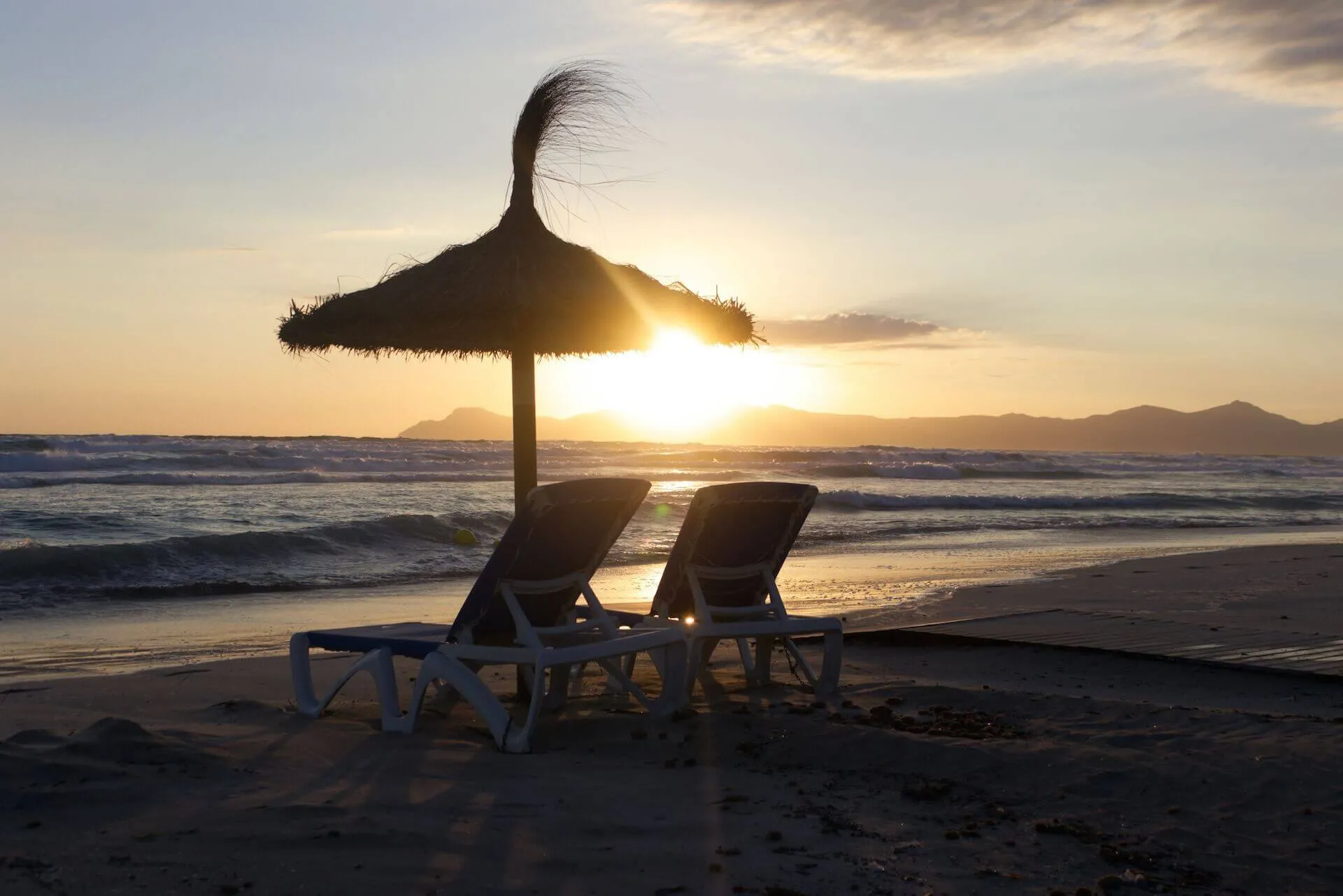 Two sunbeds at the beach