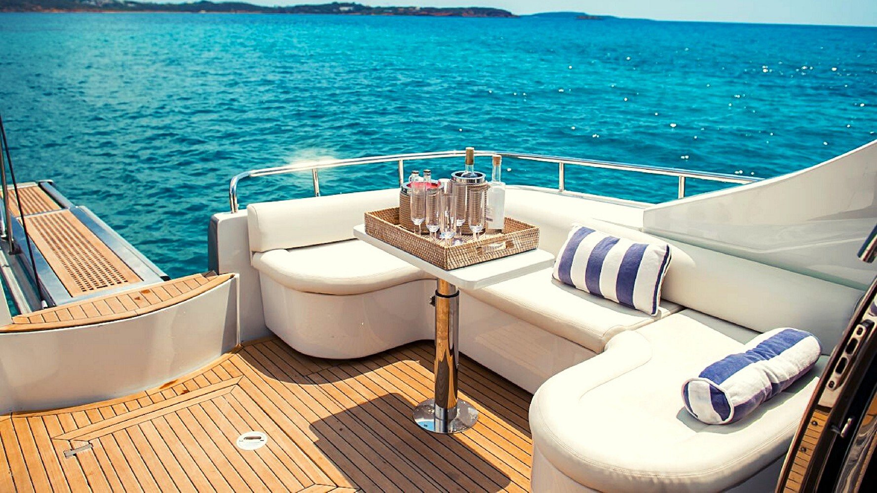 Served glasses and drinks on a yacht