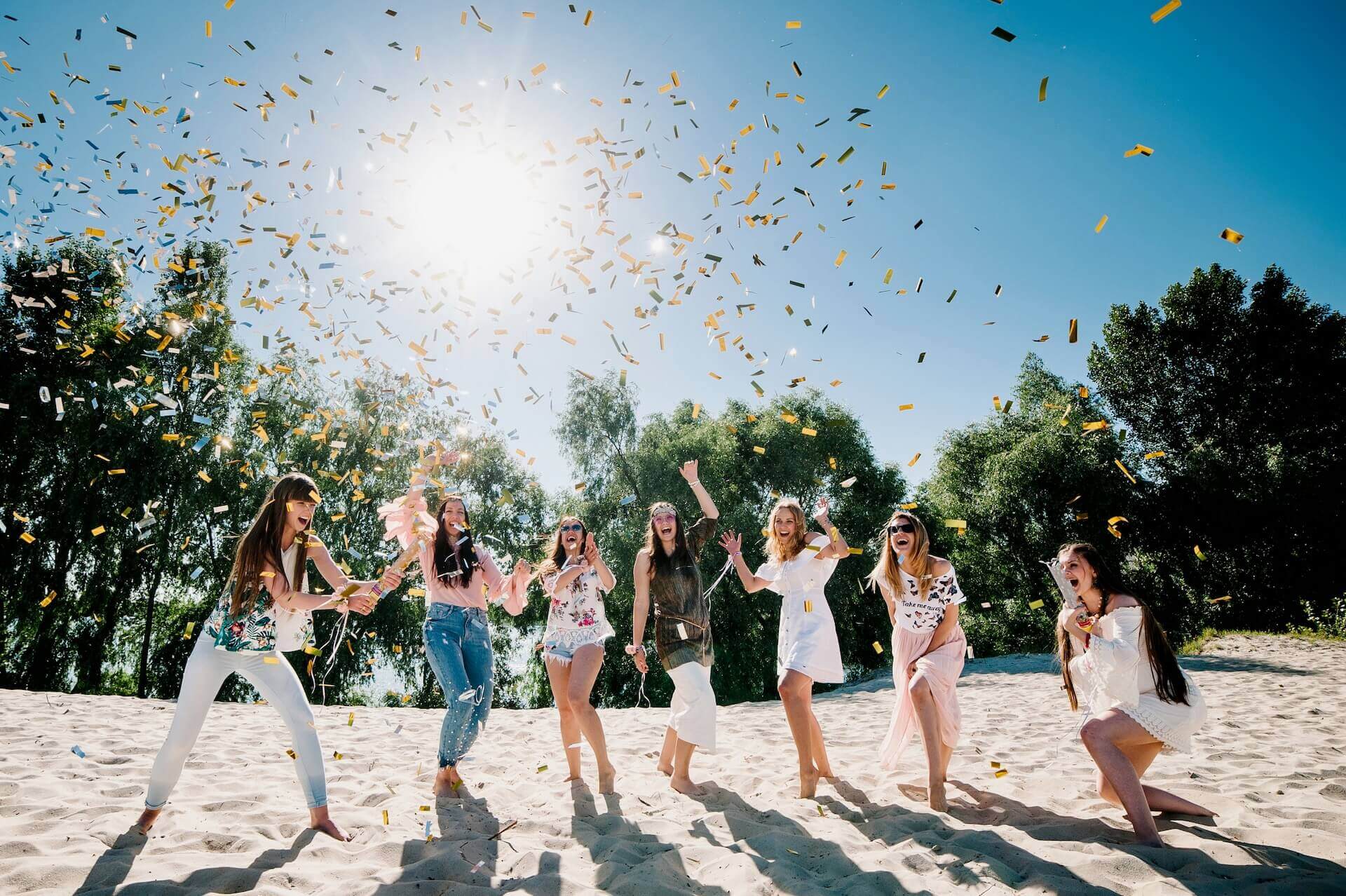  Girls celebrating at the beach