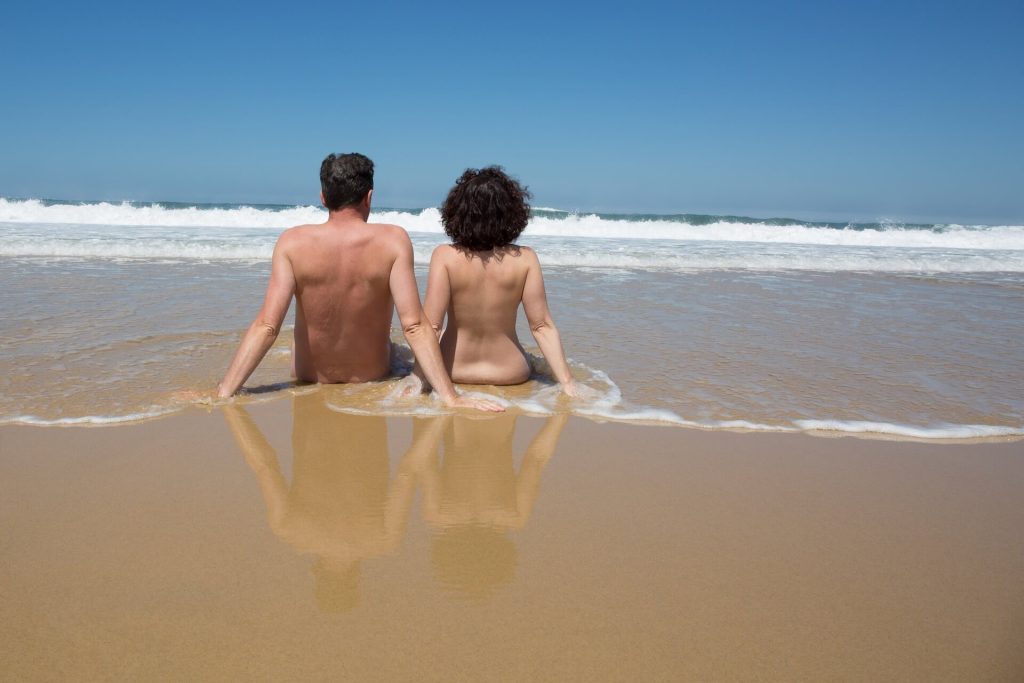 Nude couple at the beach