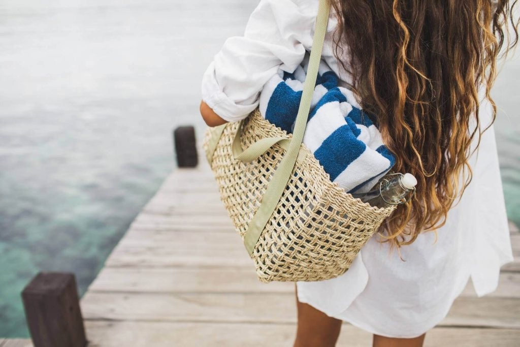 Woman with a beach bag on Mykonos