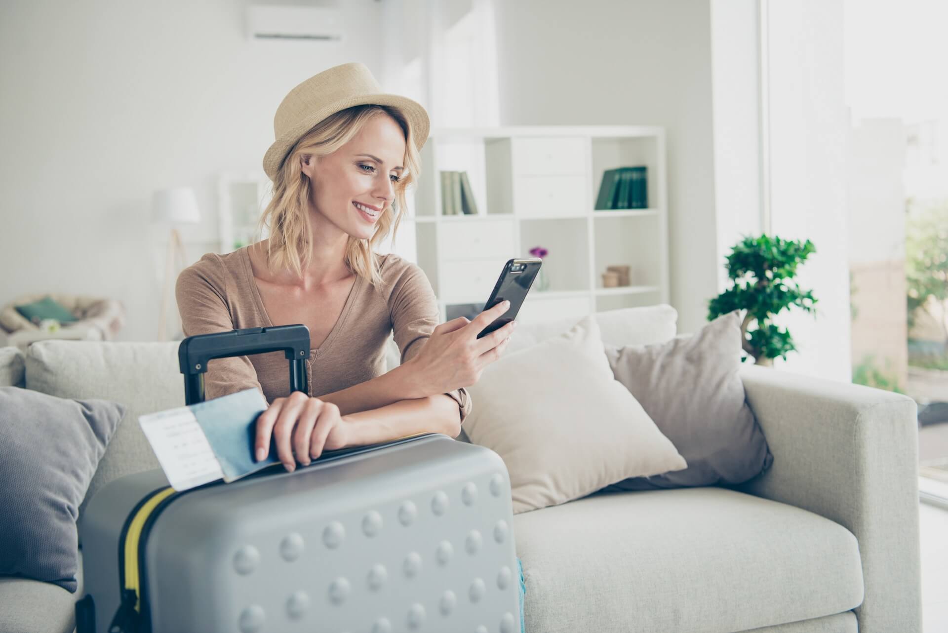 Woman booking tickets to travel