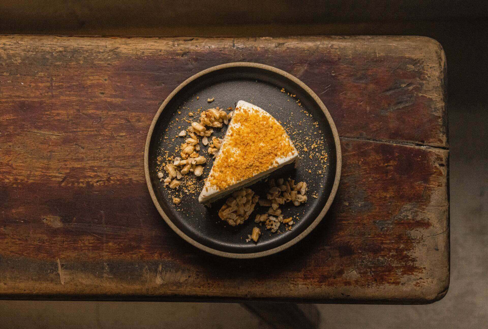 Top view of a slice of cheesecake on a plate