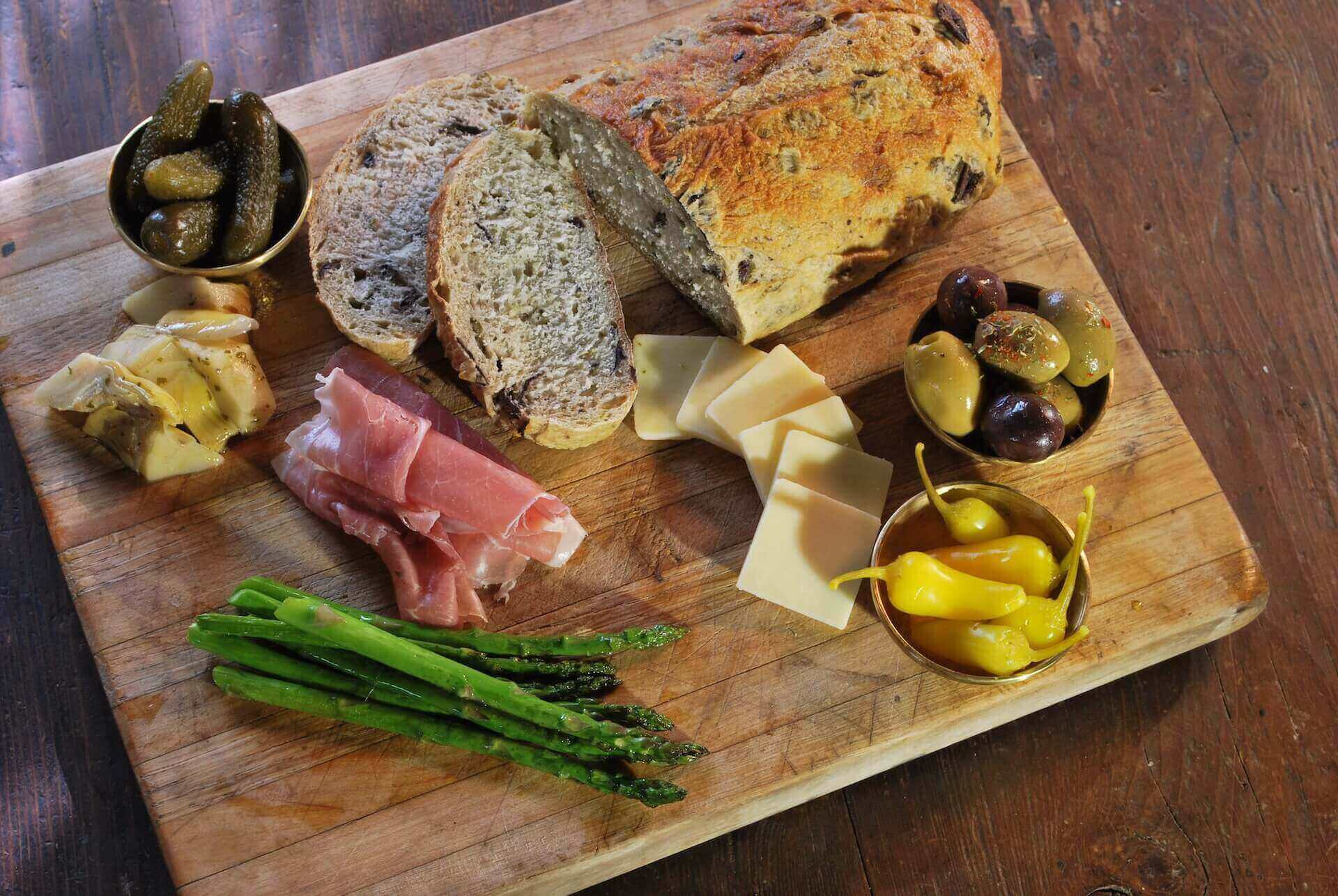 Slices of bread on a brown chopping board