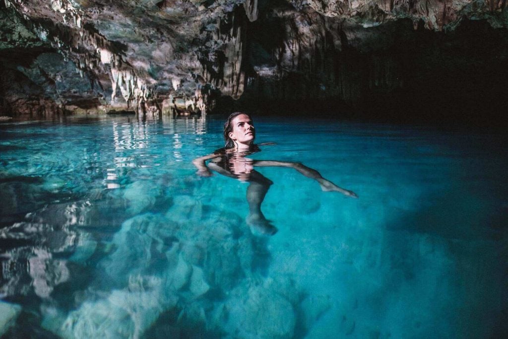 Woman in a cave in Mykonos