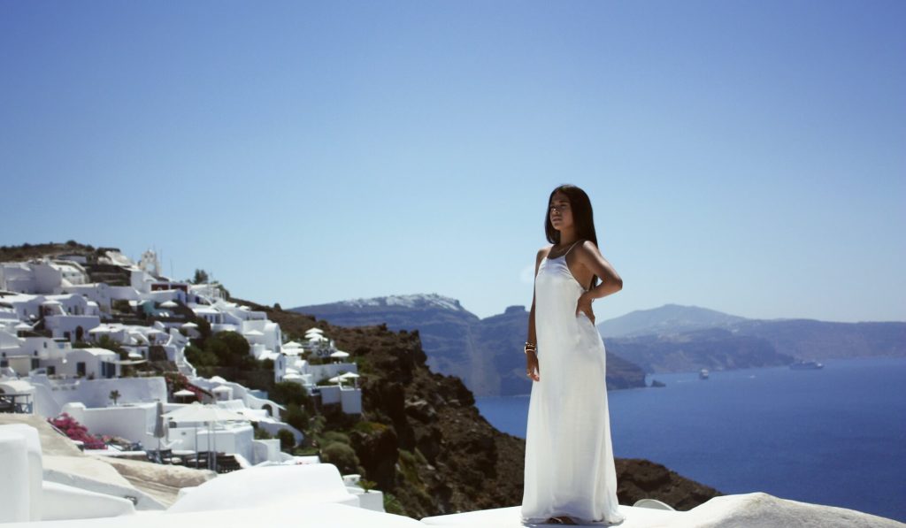 Woman traveling solo in Greece in a Mykonos luxury villa