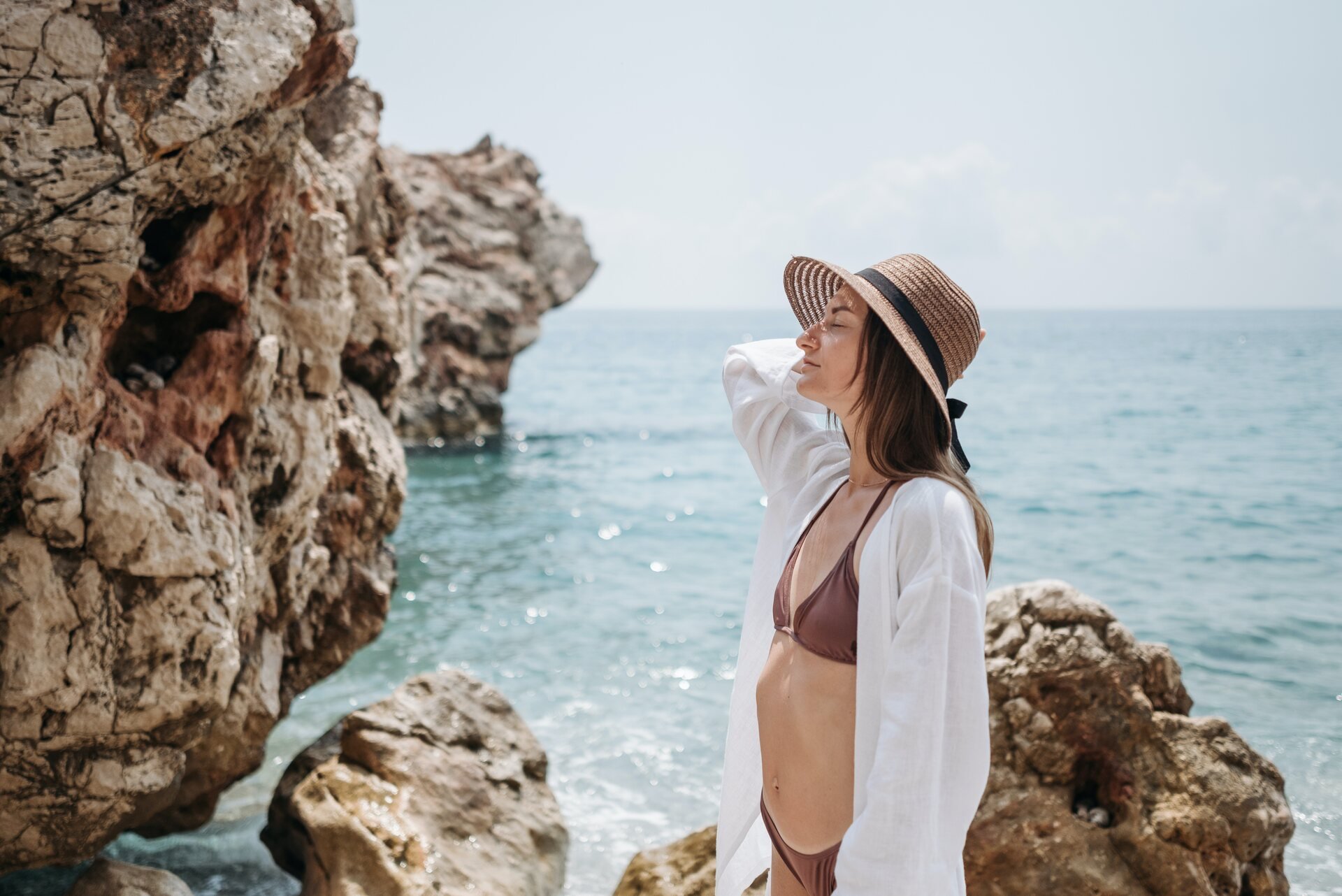 Woman on a beach in Mykonos