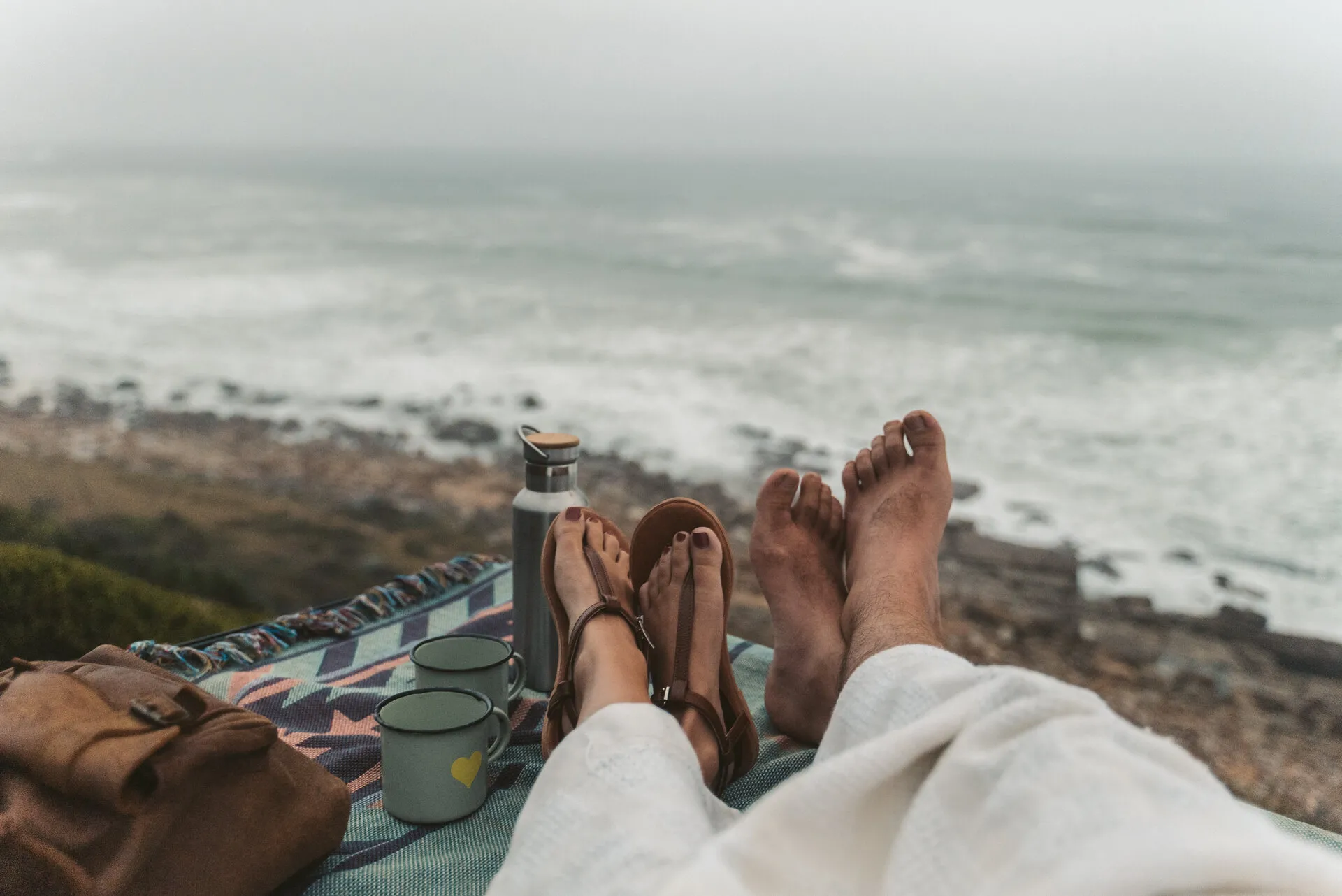 A couple lying on the beach