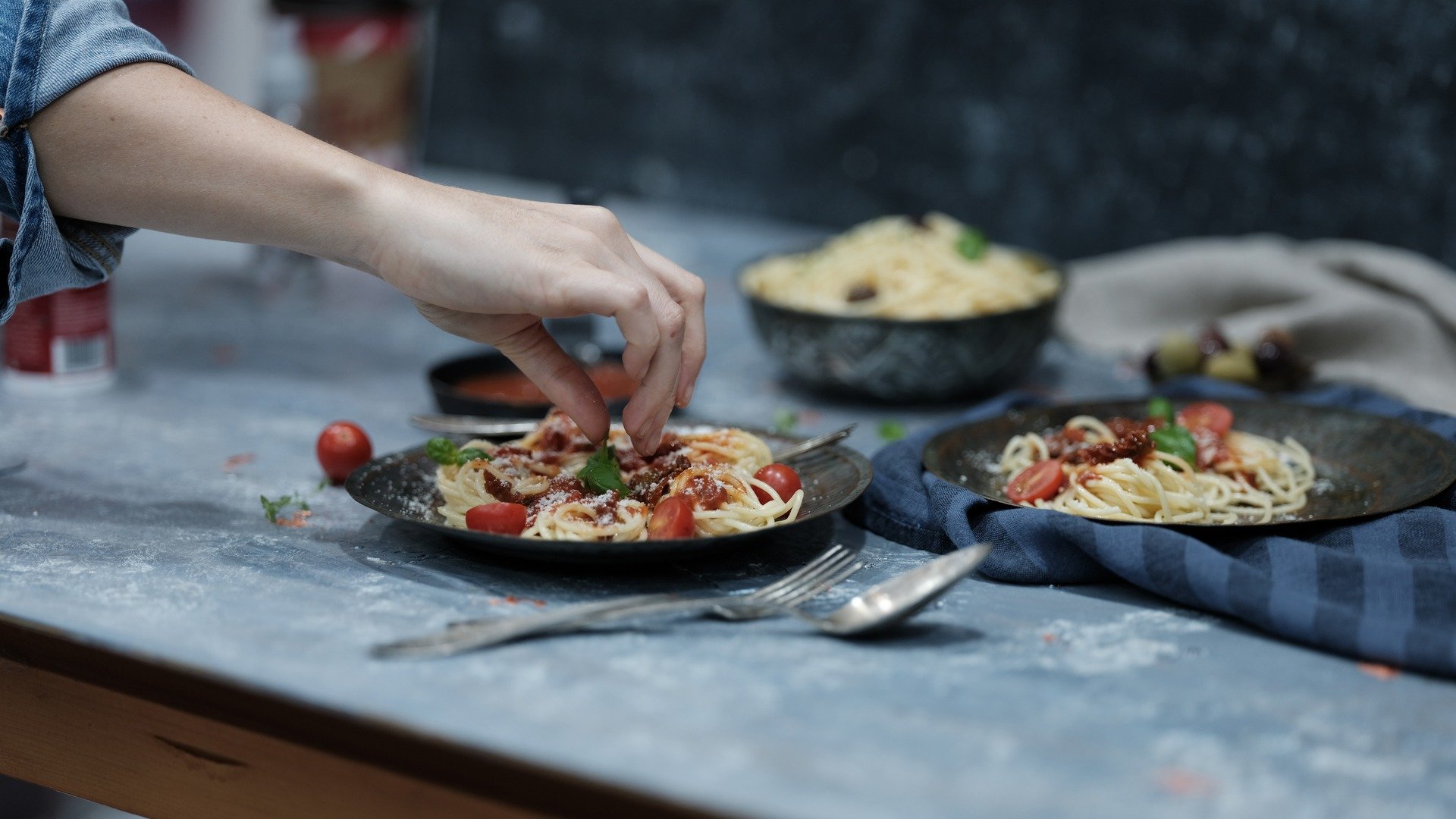  A person preparing spaghetti