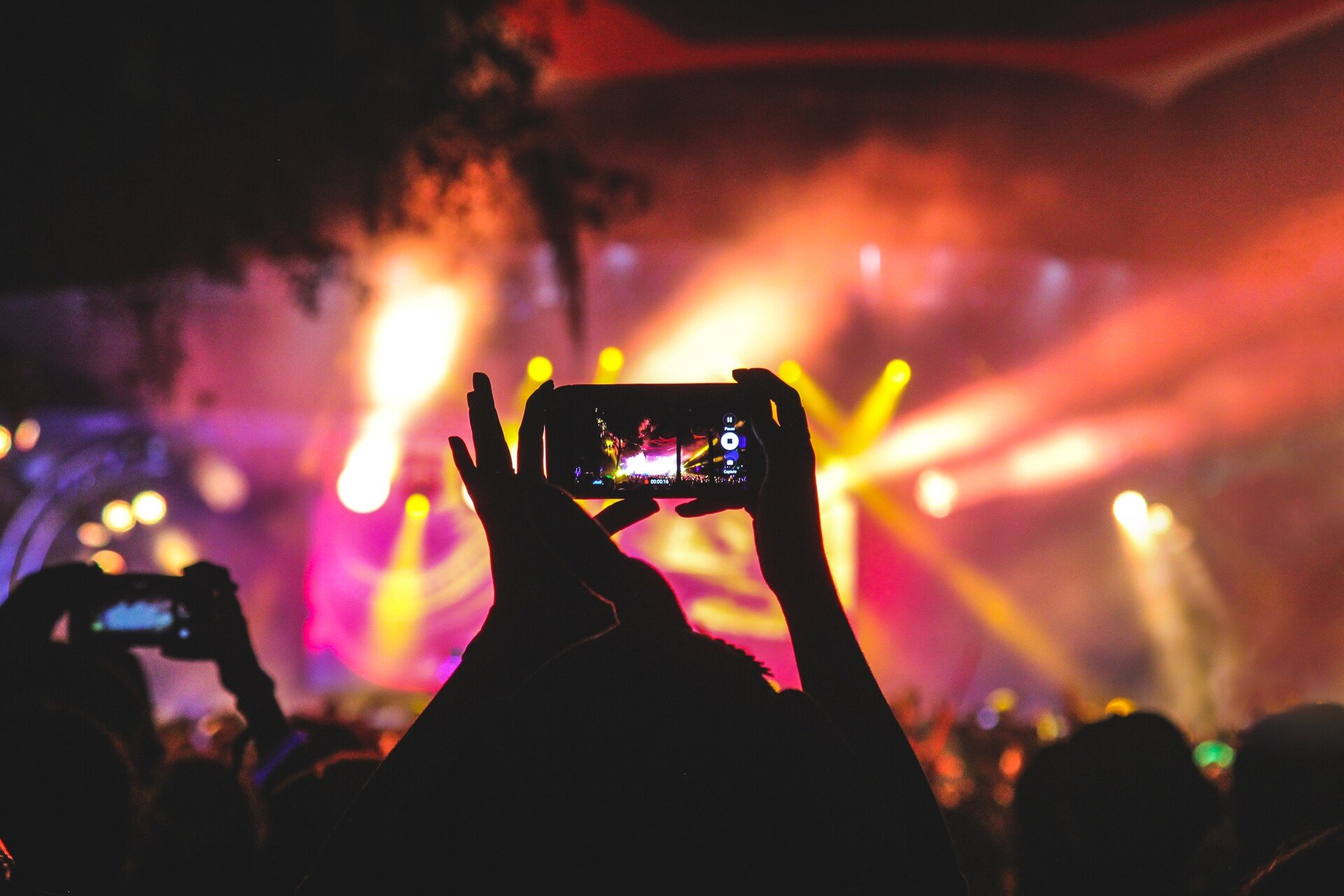 A person recording a performance