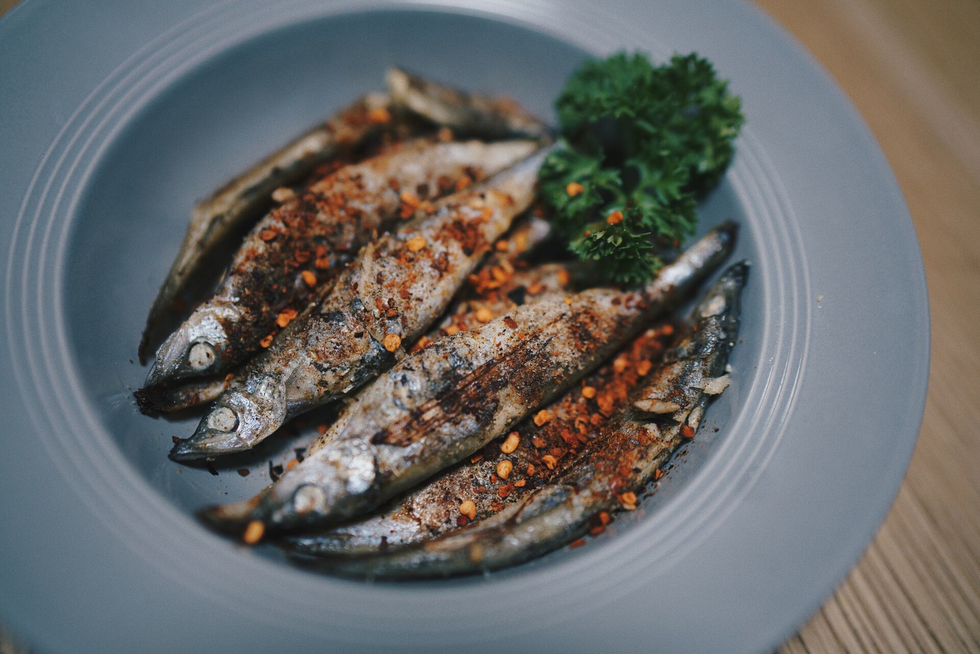 Grilled sardines on a plate