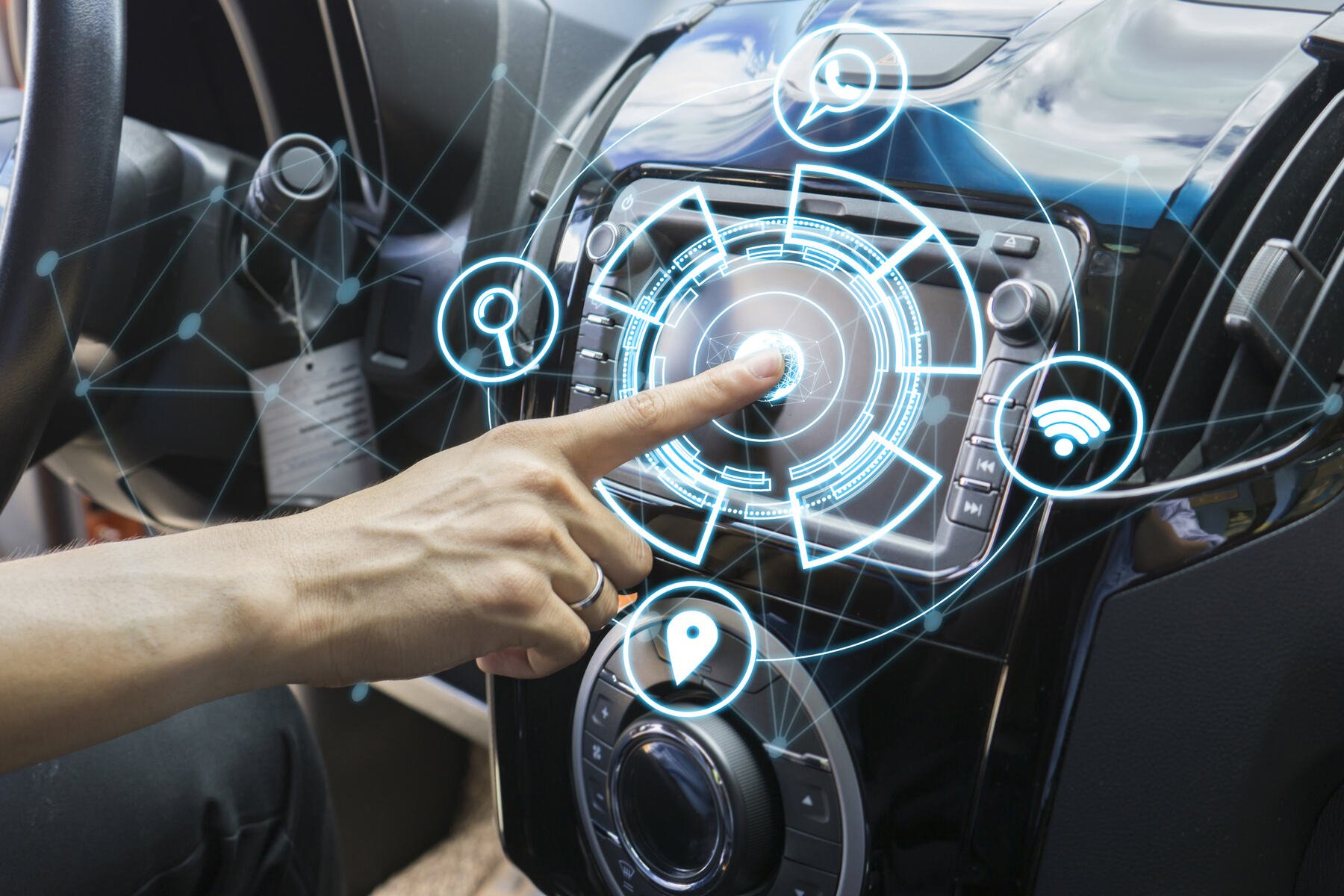 Man using a computer in the car