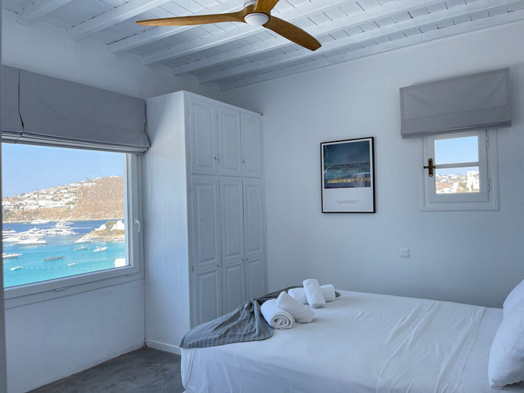 Sea view from the beautiful bedroom in Mykonos exceptional villa for rent.