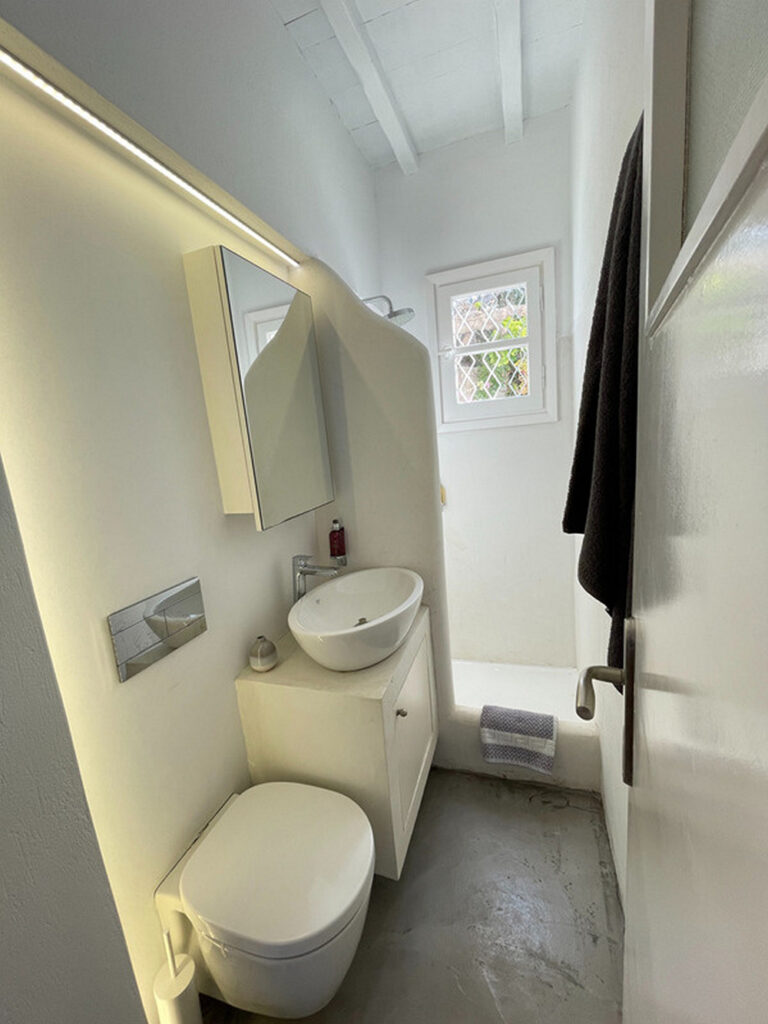 White and modern bathroom in Mykonos best rental villa to stay in.