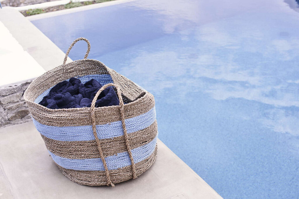 Beach bag and a private swimming pool - ready for summer in an exceptional Mykonos villa for rent.