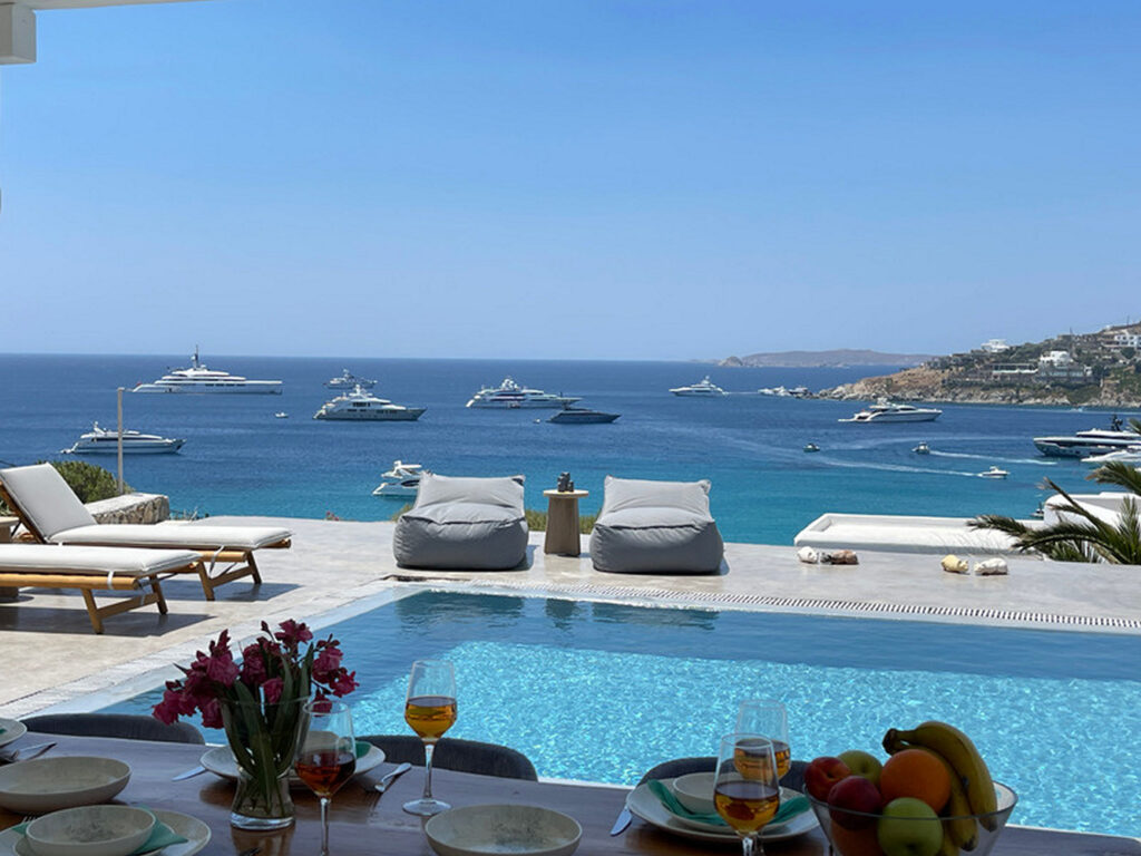 Amazing sea view from a dining table of Mykonos deluxe villa for rent.