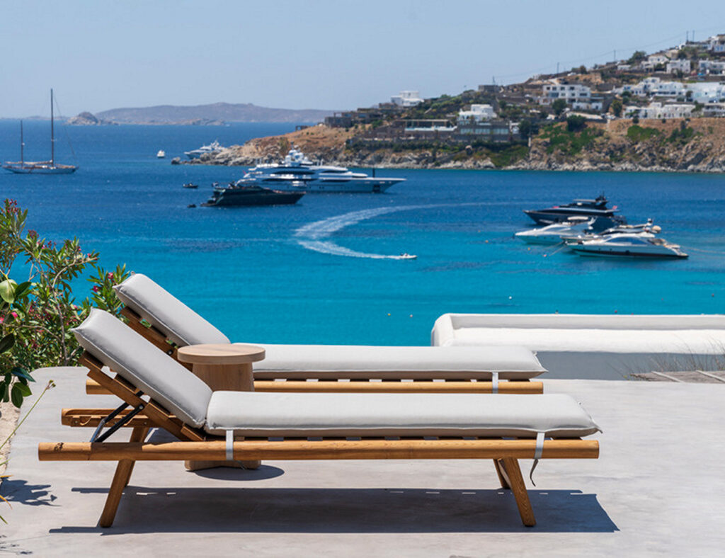 Sun beds and sea view from Mykonos vacation rental home.