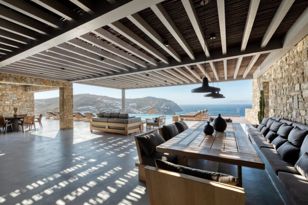 Spacious open area for gathering, having lunch, or looking at the horizon in Mykonos vacation villa for rent.