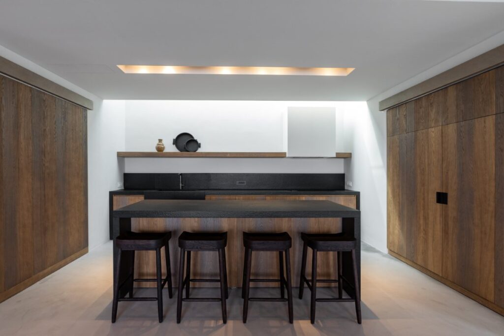 Wooden bar and modern amenities in Mykonos rental vacation villa.