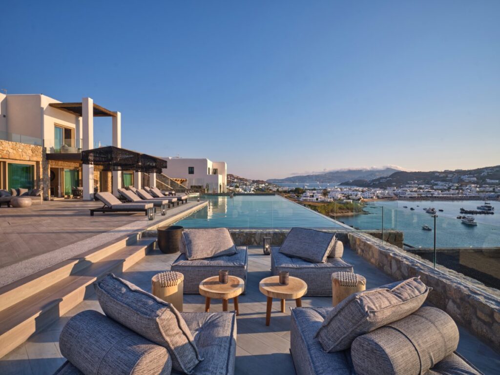Cozy garden, infinity pool, and perfect sea view spot in Mykonos splendid villa.