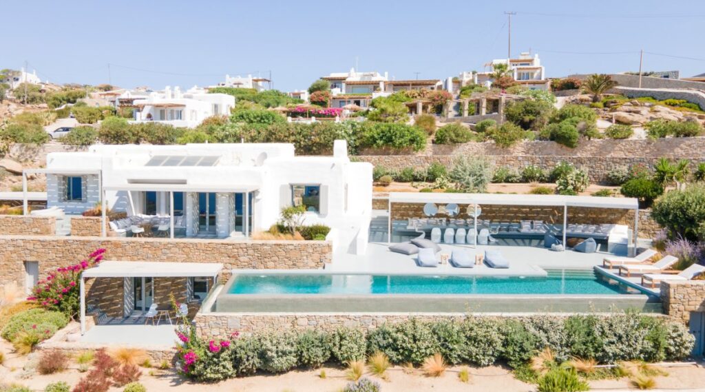 Tropical flowers, infinity pool, and spacious villa for rent, Mykonos.