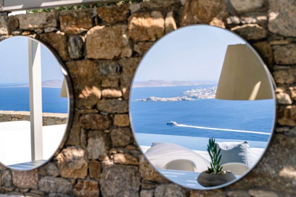 The reflection of the crystal blue sea in the mirror, Mykonos splendid rental home.