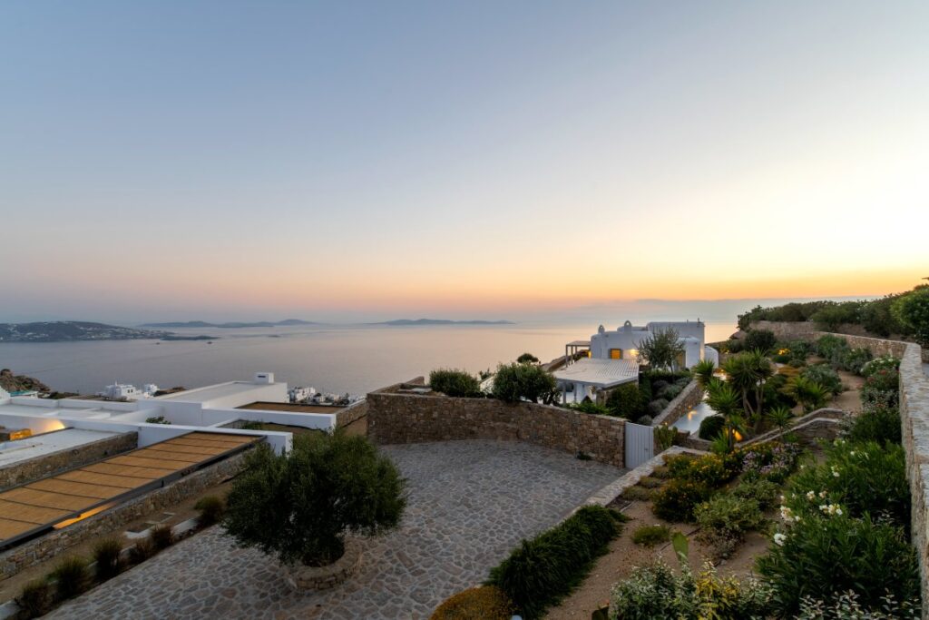 Enjoyable atmosphere in a splendid Mykonos holiday villa, with stunning sunset vistas.