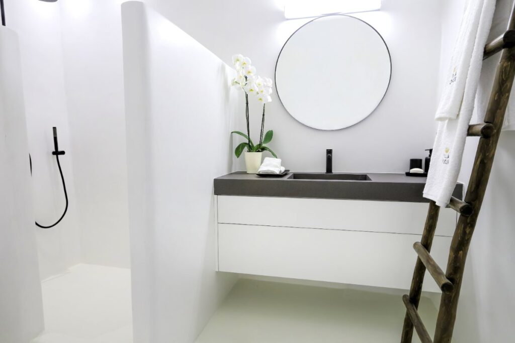 White, good quality, minimalistic bathroom in Mykonos lavish villa for rent, Greece.