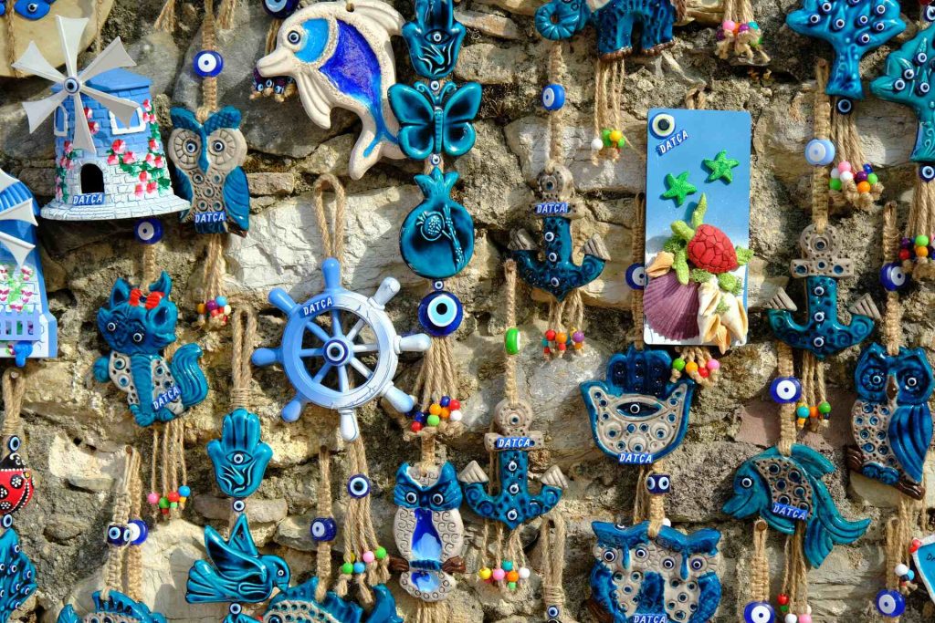 Blue Greek souvenirs on a wall