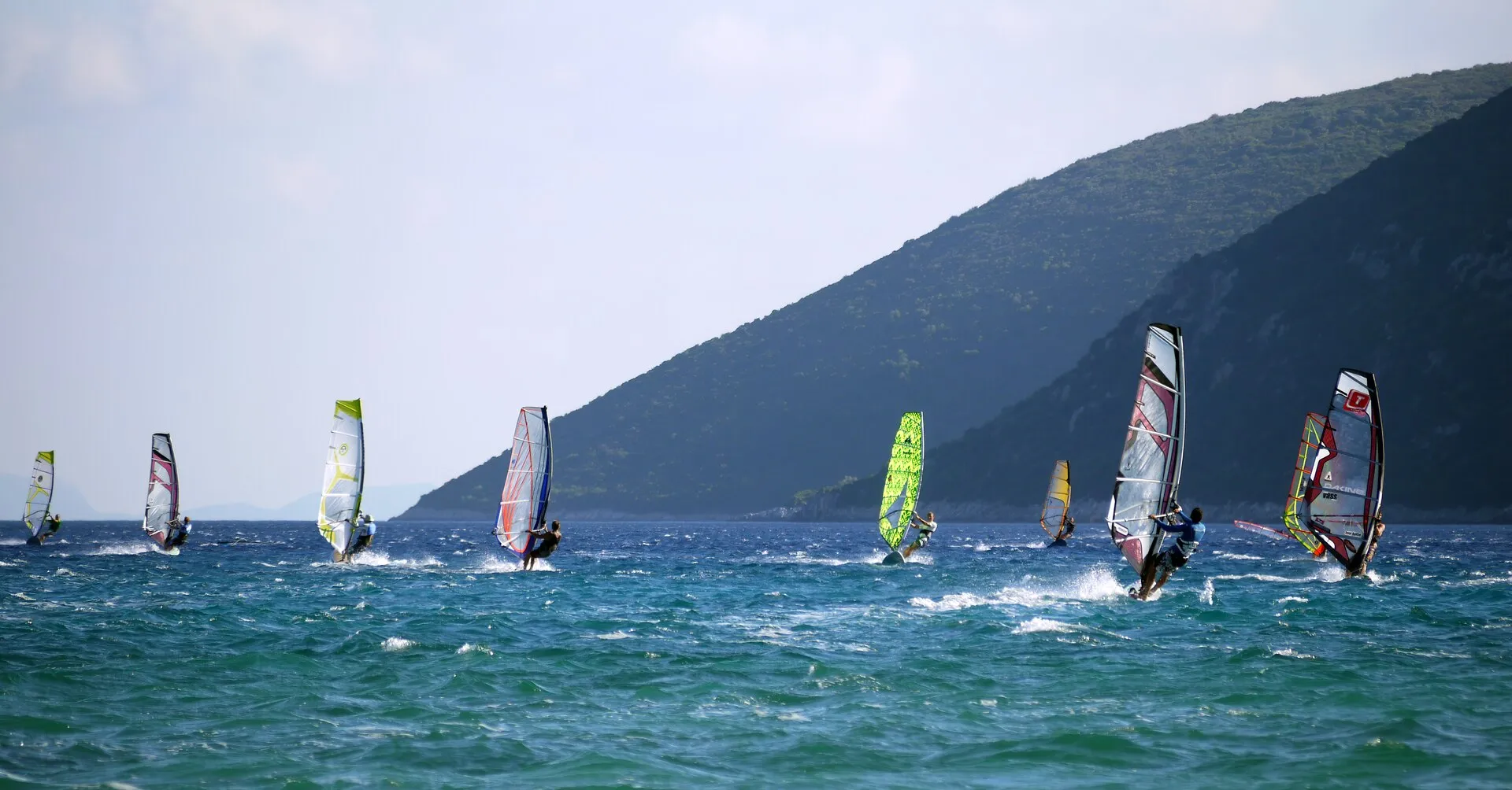 People windsurfing